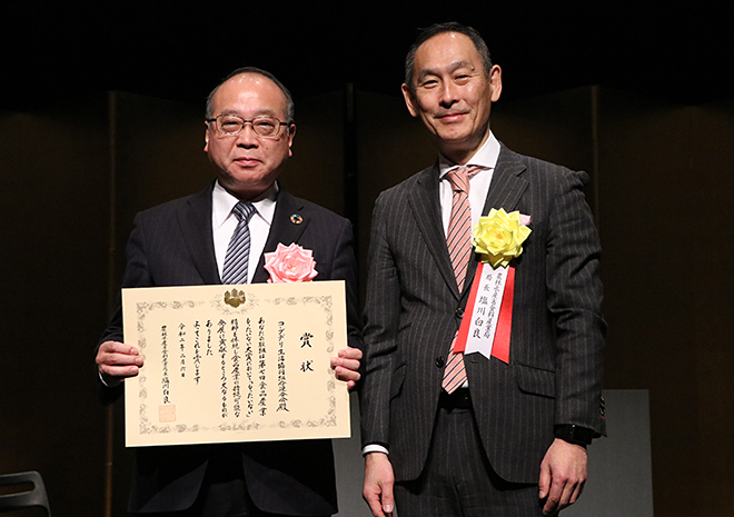 塩川白良 農林水産省食料産業局長と永井伸二郎コープデリ連合会副理事長の写真